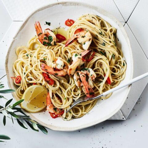 Spaghetti, garlic, olive oil and chilli with prawns